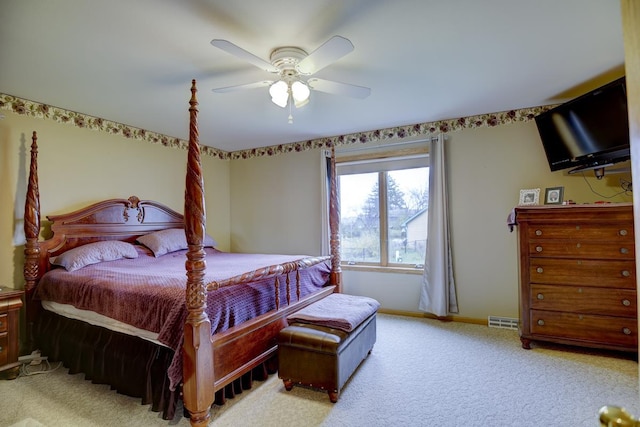 bedroom with ceiling fan and carpet