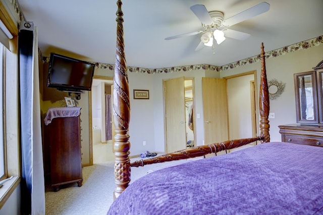 unfurnished bedroom featuring light carpet and ceiling fan