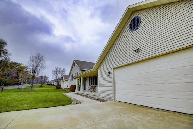 view of side of home with a lawn