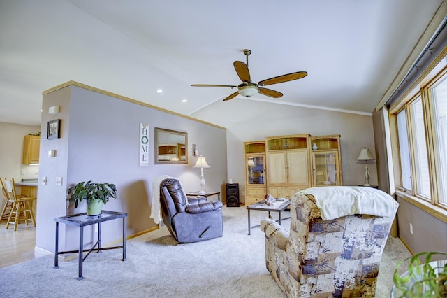 living room with light carpet, ornamental molding, ceiling fan, and lofted ceiling