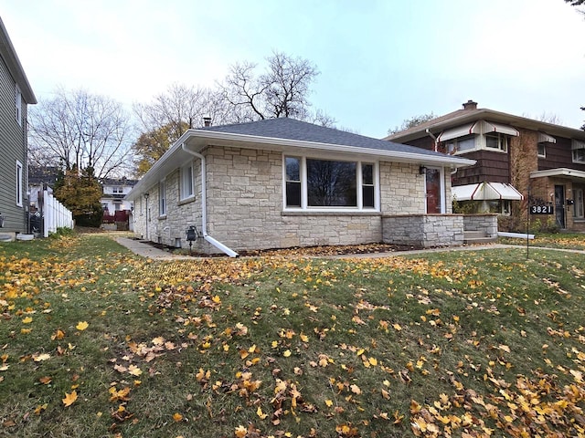 view of property exterior featuring a yard