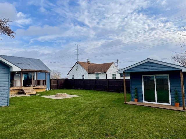 view of yard with an outdoor fire pit