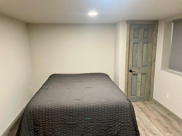 bedroom featuring light hardwood / wood-style flooring