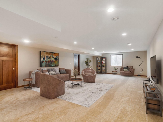 living room featuring light carpet