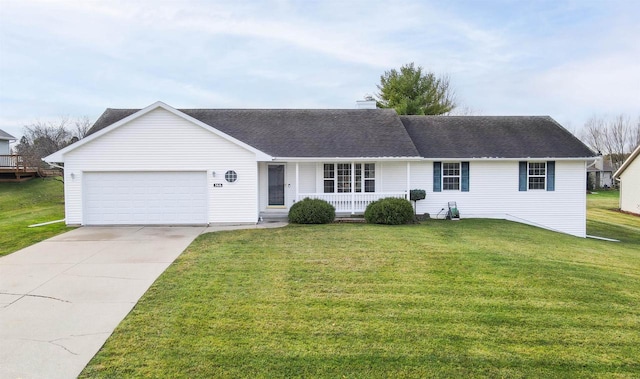 ranch-style home featuring a front lawn, covered porch, and a garage