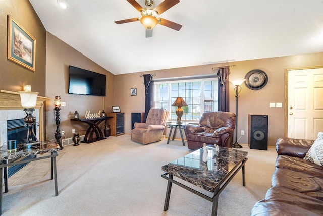 living room featuring ceiling fan, light colored carpet, and vaulted ceiling