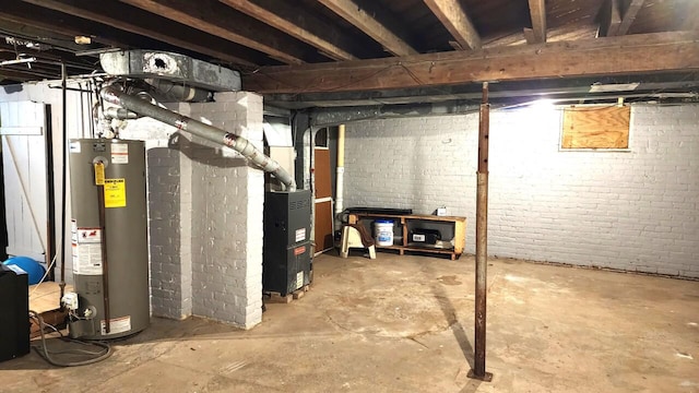 basement featuring gas water heater