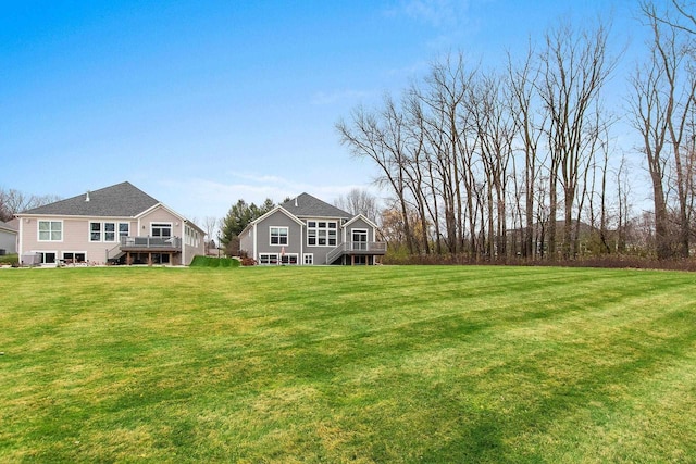 view of yard featuring a deck