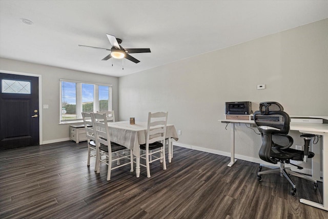 dining area with ceiling fan and dark hardwood / wood-style flooring