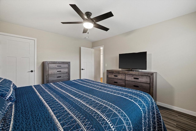 bedroom with ceiling fan and dark hardwood / wood-style flooring