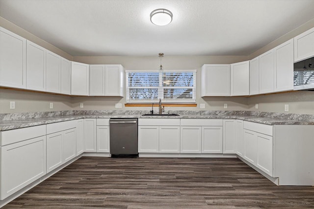 kitchen featuring stainless steel appliances, white cabinetry, and sink