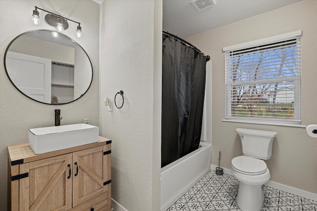 full bathroom featuring tile patterned flooring, vanity, shower / bath combination with curtain, and toilet