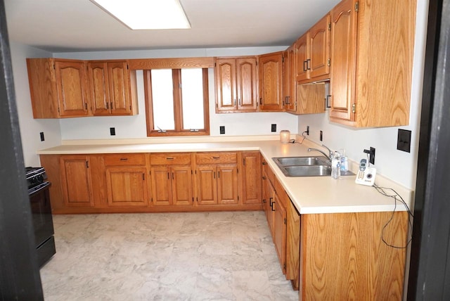 kitchen featuring sink and black electric range