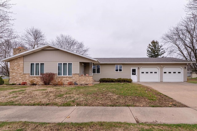 ranch-style home with a garage and a front lawn