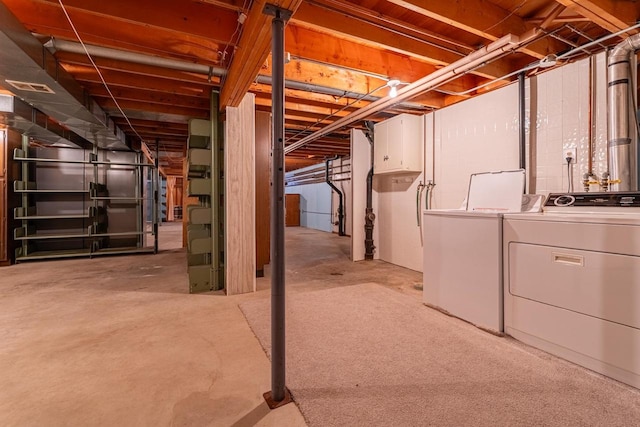 basement featuring washer and clothes dryer