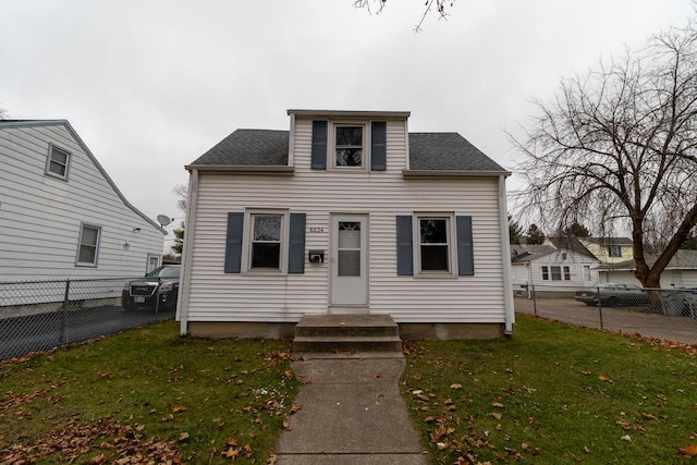 view of front of home with a front yard