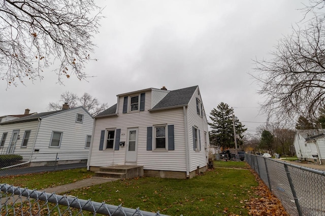 view of front of house with a front lawn