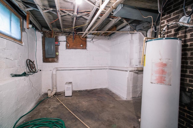 basement featuring gas water heater and electric panel