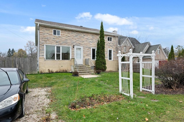 view of front of home with a front yard