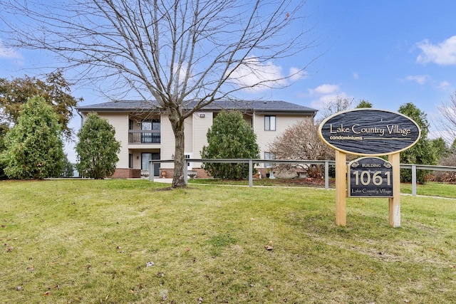 exterior space featuring a front lawn