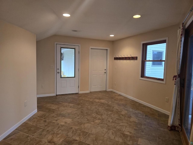 foyer entrance with lofted ceiling