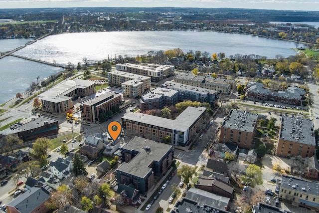 birds eye view of property featuring a water view