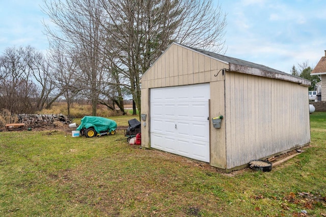 garage with a yard