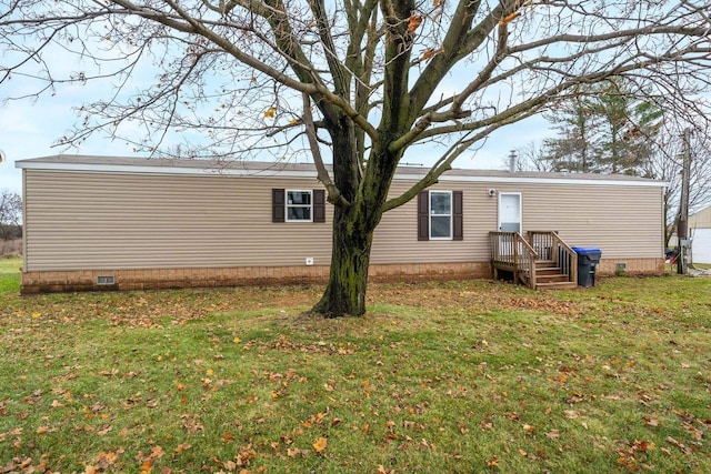 view of home's exterior featuring a lawn