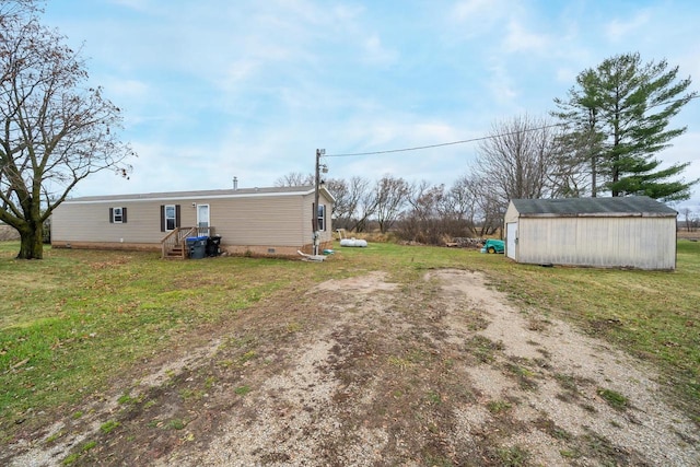 view of yard with a storage unit