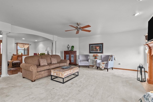4207 Lost Dauphin Rd, De Pere, WI 54115 - living room with decorative columns, carpet floors, a ceiling fan, and recessed lighting