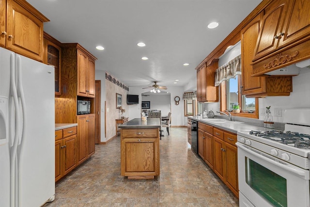 4207 Lost Dauphin Rd, De Pere, WI 54115 - kitchen featuring white appliances, a ceiling fan, recessed lighting, and brown cabinetry
