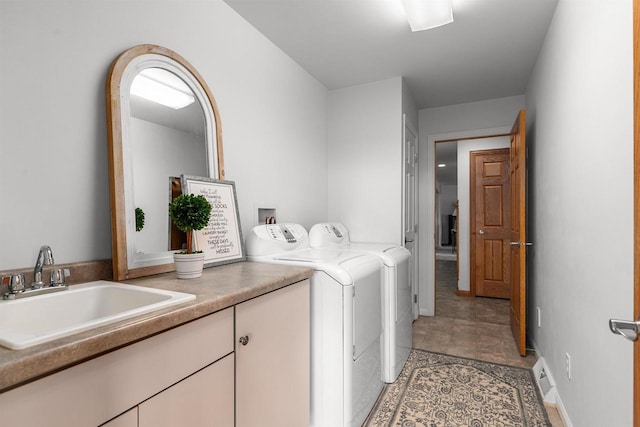4207 Lost Dauphin Rd, De Pere, WI 54115 - laundry area with cabinet space and washing machine and dryer