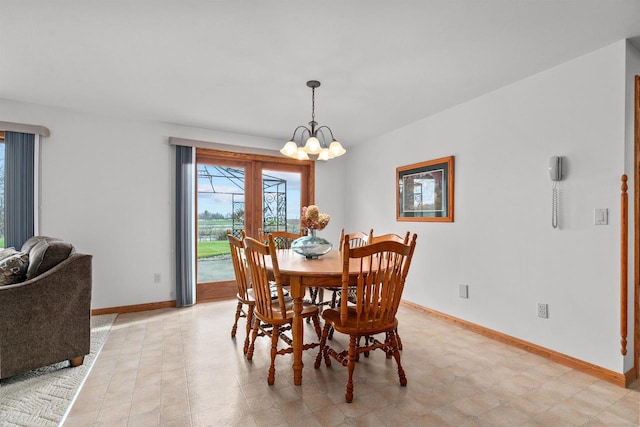 4207 Lost Dauphin Rd, De Pere, WI 54115 - dining room featuring a chandelier and light flooring