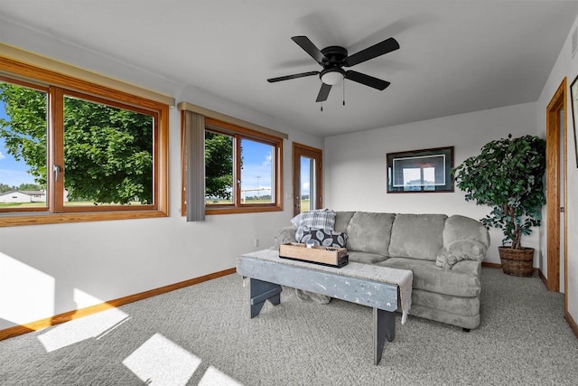 4207 Lost Dauphin Rd, De Pere, WI 54115 - carpeted living room featuring baseboards and a ceiling fan