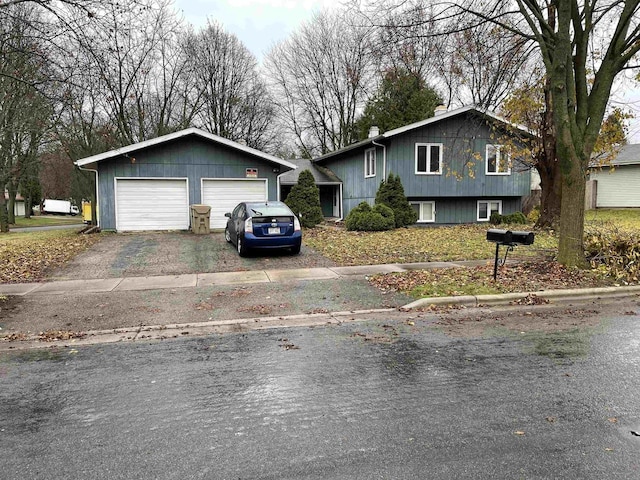 split level home with a garage