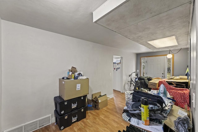 miscellaneous room featuring hardwood / wood-style floors