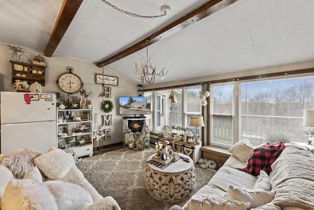 carpeted living room featuring lofted ceiling with beams