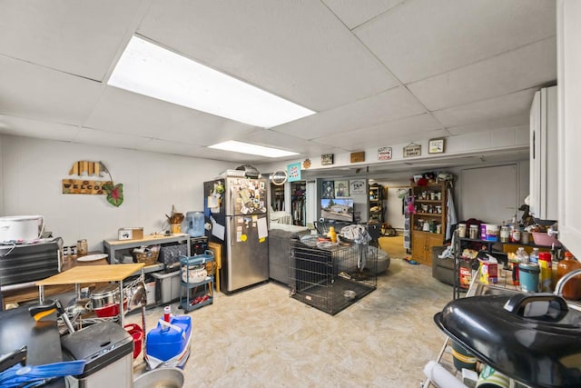 miscellaneous room with a paneled ceiling