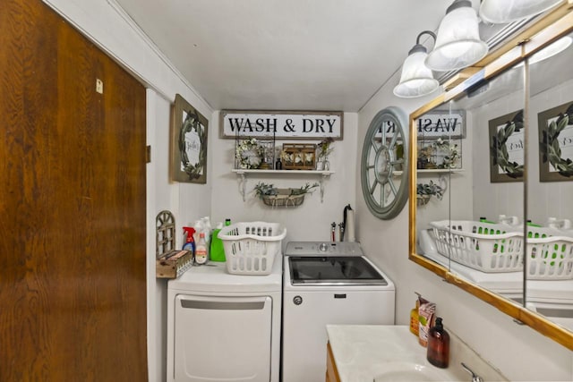 laundry area with separate washer and dryer