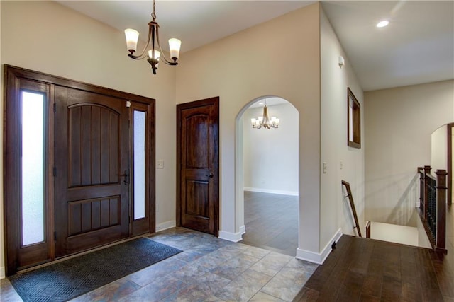 foyer featuring a notable chandelier