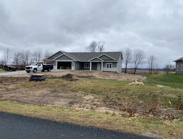 view of front of property featuring a garage