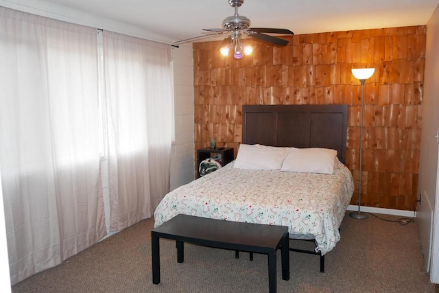 bedroom with light carpet and ceiling fan