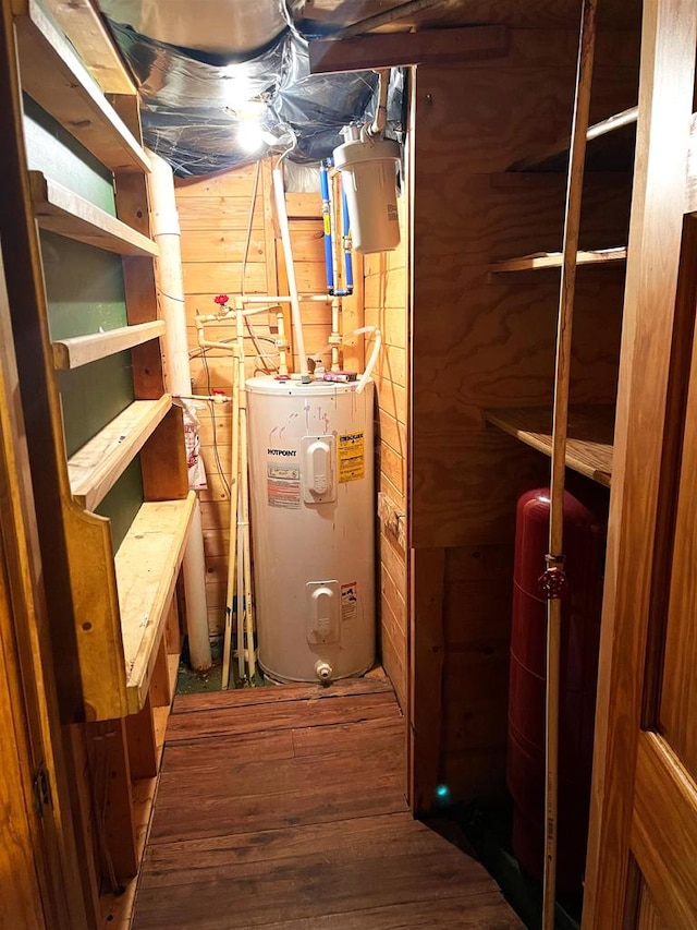 utility room with water heater