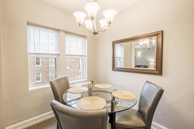 dining room featuring an inviting chandelier