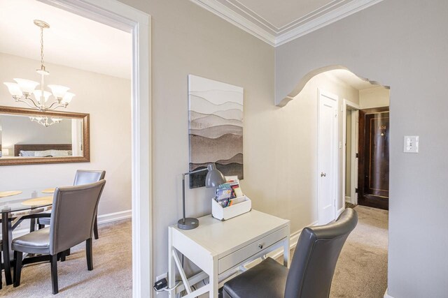 carpeted office featuring crown molding and a chandelier