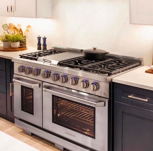 663 Eagleton Dr Unit 55-11, Lake Geneva, WI 53147 - kitchen featuring range with two ovens and light countertops