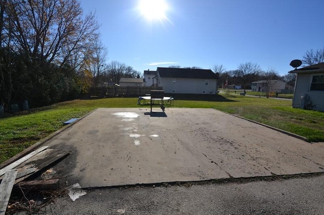 exterior space with a patio area and a lawn