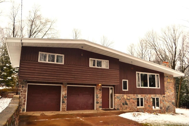 view of front of property with a garage