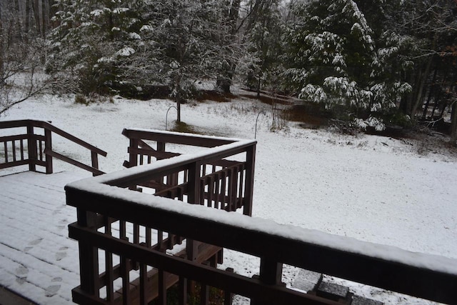 view of snow covered deck