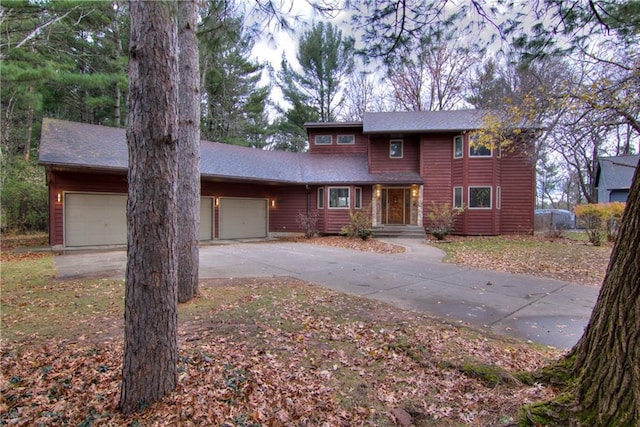 view of front of property with a garage